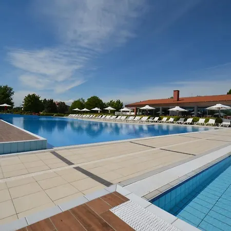 Magica Immobiliare - Golf Village 68 Apartment