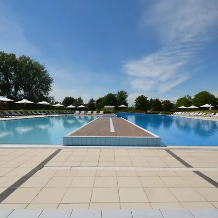 Magica Immobiliare - Golf Village 68 Apartment